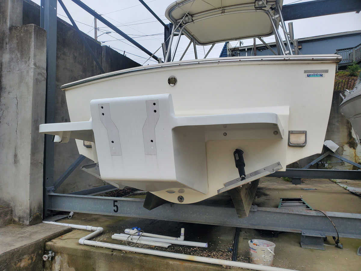 a boat with the outboard engine removed